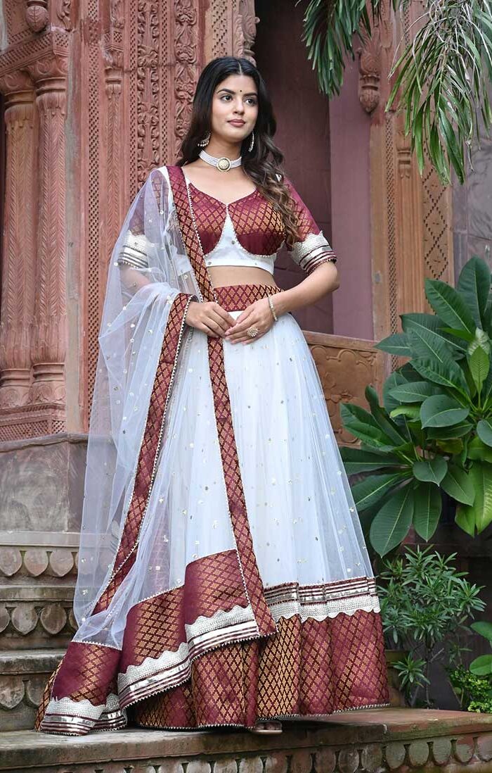 PEARL WHITE NET WITH BURGUNDY CONTRAST LEHENGA